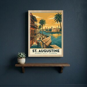 May include: A rectangular wall art print featuring a stylized illustration of St. Augustine, Florida. The scene depicts a waterfront walkway with palm trees, historic buildings, and people walking, set against a warm yellow sky and blue water.