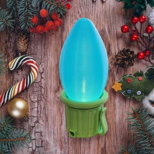Adorables luces navideñas gigantes brillantes alimentadas por velas de té para una transformación mágica de la decoración navideña.