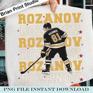 May include: A white fabric featuring a hockey player in a black and gold uniform with the name "ROZANOV" repeated in gold. The player's jersey displays the number "81". The text "PNG FILE INSTANT DOWNLOAD" is at the bottom.