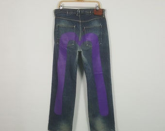 Jeans vintage in denim con cimosa Daicock Custom Art di marca giapponese Evisu