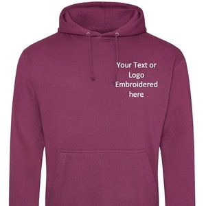 May include: A maroon hooded sweatshirt with a pocket on the front. The text "Your Text or Logo Embroidered here" is printed on the front of the sweatshirt.