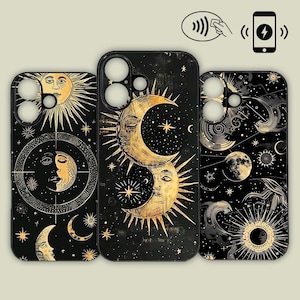 May include: Three black phone cases with celestial designs. The cases feature gold sun and moon illustrations, stars, and intricate patterns. The designs have a vintage, mystical aesthetic. The cases are shown with a wireless charging symbol.