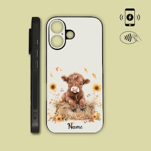 May include: A phone case with a watercolour illustration of a brown Highland cow calf on a hay bale, with sunflowers and autumn leaves. The word "Name" is printed at the bottom. The case is shown next to a black phone.