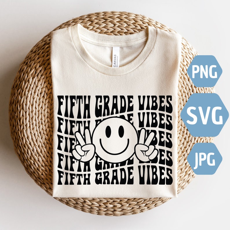 May include: A white t-shirt with the text "FIFTH GRADE VIBES" repeated in a retro font. A smiling face with peace signs is in the center of the design.
