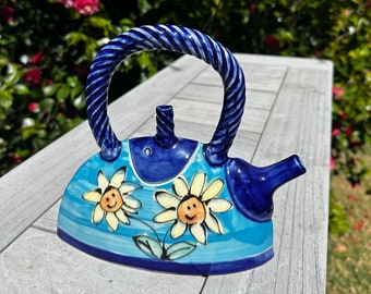 Jan Bell Handbag Teekanne mit blauem Hintergrund und leuchtend gelben Blumen, australisch