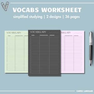 May include: Vocabulary worksheet with three different colored pages: light green, dark gray, and pink. Each page has a vocabulary table with columns for word, pronunciation, and meaning. A silver pen and paper clips are also in the image. The text reads "VOCABS WORKSHEET".