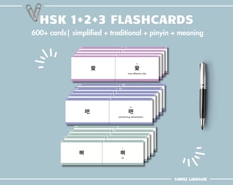 May include: A set of HSK 1+2+3 flashcards with simplified and traditional Chinese characters, pinyin, and English translations. The flashcards are stacked in a pile, with the top card showing the character "爱" (love) and its English translation.