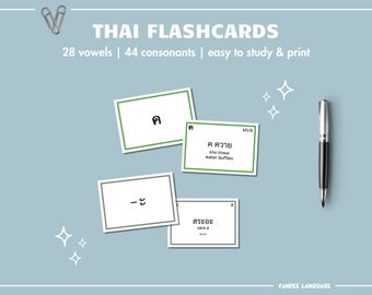 May include: Thai flashcards with green and white borders. The cards feature Thai characters and English translations. The text on the cards reads "ค ควาย kho khwal water buffalo" and "สระอะ sara a short".