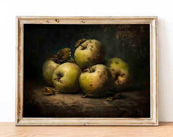 May include: A framed print depicting a still life of green apples with yellow hues. The apples are grouped together on a dark, textured surface, with some leaves. The frame is made of light-coloured wood.
