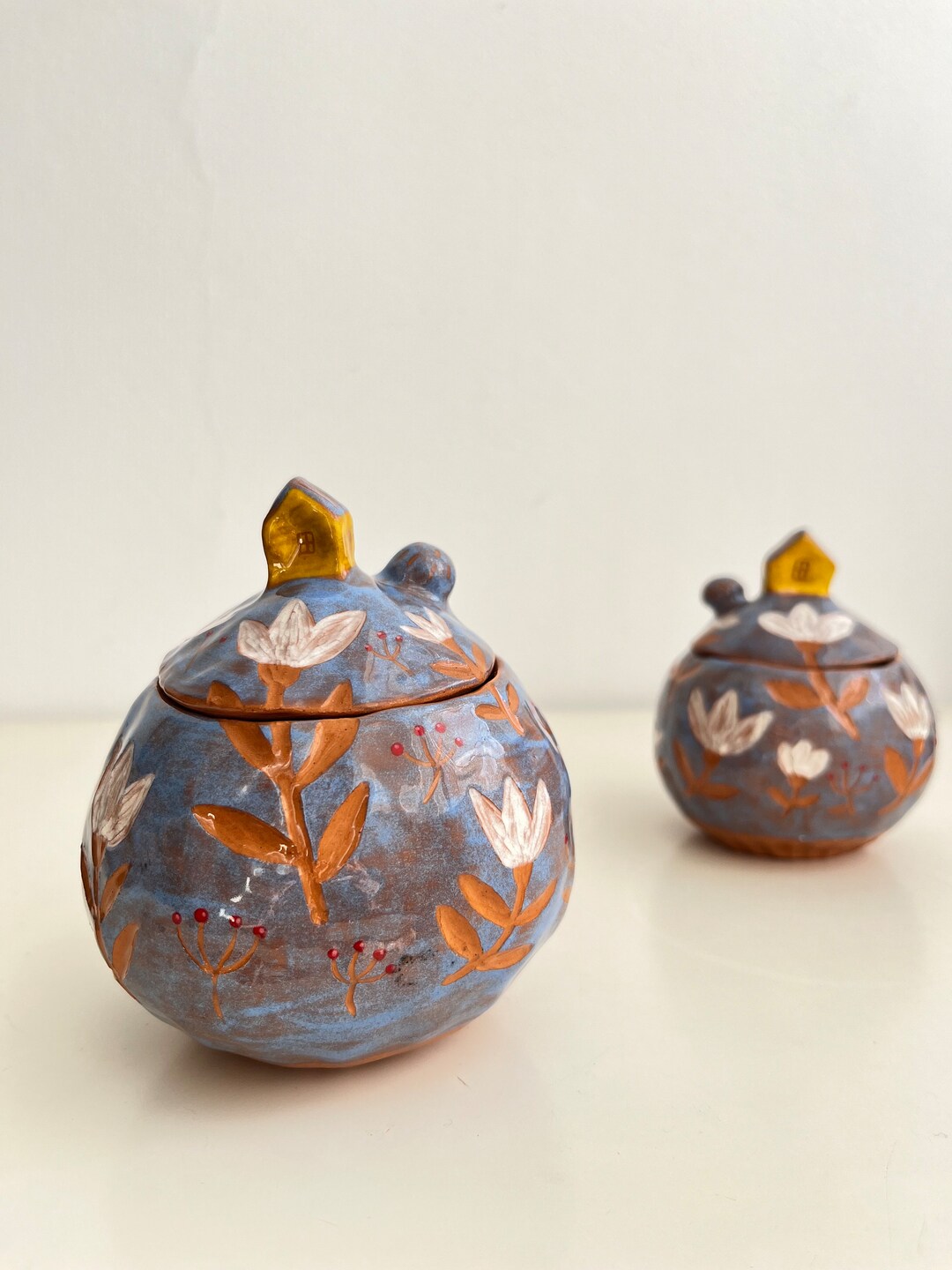 Light Blue Sgraffito Keepsake Box With White Flowers and a Tiny House