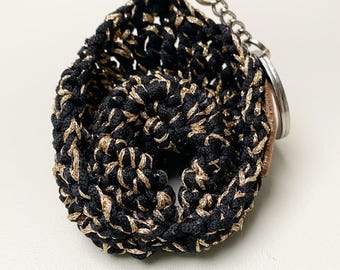 Crochet bag charm, crochet tortellino keychain, black and gold crochet tortellino, crochet hat keychain,