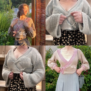 May include: A grey and pink crochet wrap cardigan with a tie closure. The cardigan is cropped and has long sleeves. The text "Crochet Therapy" is visible on the cardigan.