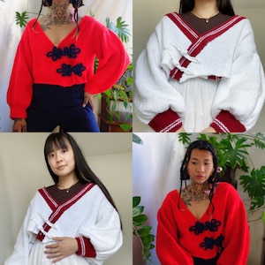 May include: Four different models wearing red and white knit sweaters with contrasting trim. The sweaters have a V-neck and are cropped. The sweaters have a unique knot detail at the front.