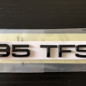 Glanzend zwart 35 TFSI kofferbakbadge Audi