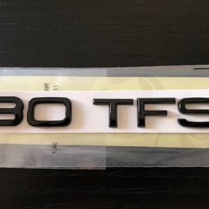 Glanzend zwarte 30 TFSI-kofferbakbadge Audi