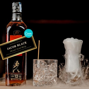 May include: A bottle of Johnnie Walker Jacob Black Blended Scotch Whisky, aged 12 years, with a gold label that reads "Jacob Black Blended Scotch Whisky Distilled, Blended and Bottled in Scotland". The bottle is on a dark surface with a glass of ice and a glass with a white, cloudy substance that looks like smoke.