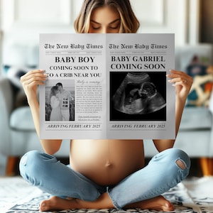 May include: A woman sits cross-legged, holding two newspaper-style announcements. The headlines read "The New Baby Times" and announce "Baby Boy" and "Baby Gabriel" are "Coming Soon." The announcements include sonogram images and the date "February 2025."