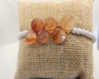 Teardrop carnelian and antique white milk glass rounds, bracelet
