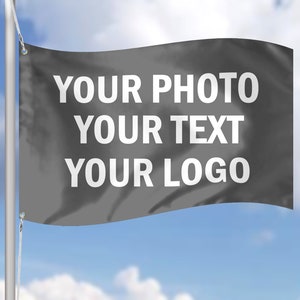 May include: A black flag with white text that says "YOUR PHOTO YOUR TEXT YOUR LOGO".