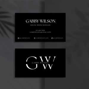 May include: Black and white business card with the name Gabby Wilson, Social Media Manager, and contact information. The second card has the initials GW in a circle with the name Gabby Wilson below.