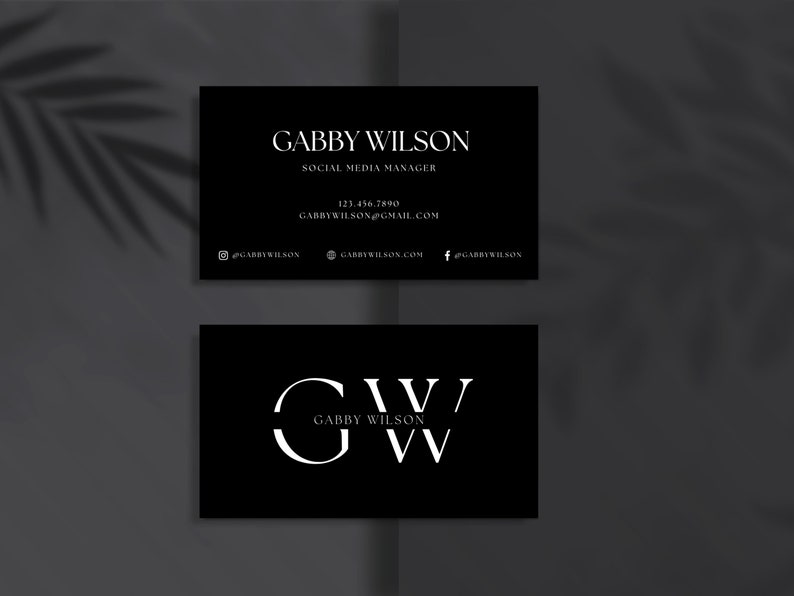 May include: Black and white business card with the name Gabby Wilson, Social Media Manager, and contact information. The second card has the initials GW in a circle with the name Gabby Wilson below.