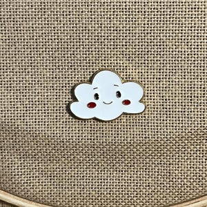 Tiny happy cloud magnetic needle minder