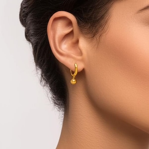 18kt gold-plated ball drop huggie earrings/clean chic/quiet luxury