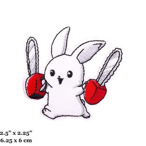 Puede incluir: Un conejo blanco sosteniendo dos motosierras rojas. El conejo sonríe y tiene ojos grandes. Las motosierras están delineadas en negro. La imagen mide 6,25 cm por 6 cm.