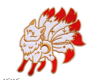 May include: Embroidered iron-on patch featuring a white fox with nine red tails. The fox has a crescent moon and stars on its body. The patch measures 3.5 inches by 3.5 inches.