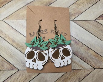 Pendientes de calavera con forma de maceta