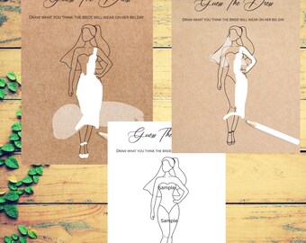 Può includere: Due carte di gioco stampabili "Indovina l'abito" con un disegno a linea di una sposa in abito da sposa. Le carte hanno uno sfondo marrone e il testo è nero. Le carte sono su una superficie di legno.