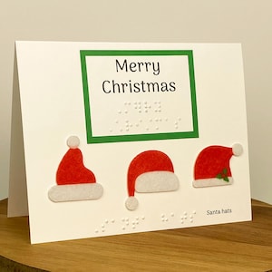 Carte de Noël personnalisable en braille avec des chapeaux de père Noël tactiles