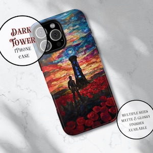 May include: A colorful iPhone case with a stained glass design featuring a tower, a figure, and red roses. The case has the text "DARK TOWER" and "IPHONE CASE" on it.