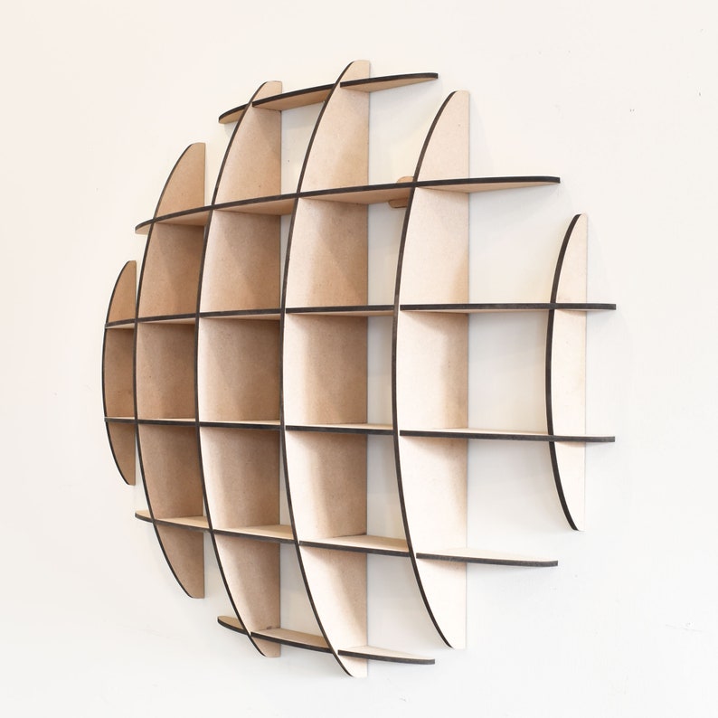 May include: A wooden wall shelf shaped like a globe with multiple compartments. The shelf is made of light brown wood with black edges.