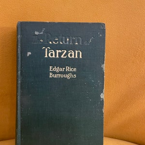 Livro antigo O Retorno de Tarzan/Tarzan dos Macacos, de Edgar Rice Burroughs