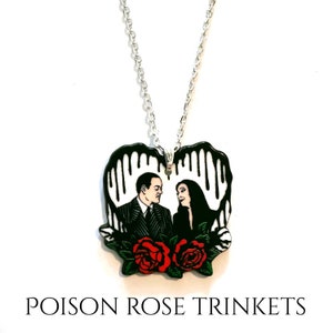 Handmade Morticia and Gomez Addams heart necklace