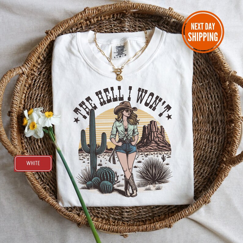a white t - shirt with a picture of a woman on it