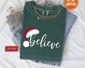 Camiseta Believe Christmas Comfort Colors®, Camiseta navideña Believe, Camiseta para fiesta navideña, Camiseta navideña familiar, Regalo de Navidad, Camisetas navideñas