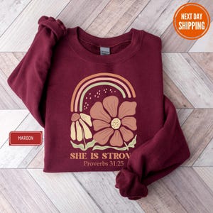 Christian She is Strong Sweatshirt, Proverbs 31:25, Bible Verse Sweatshirt, Jesus Sweatshirt, Floral Christian Mom Sweatshirt, Faith Hoodie