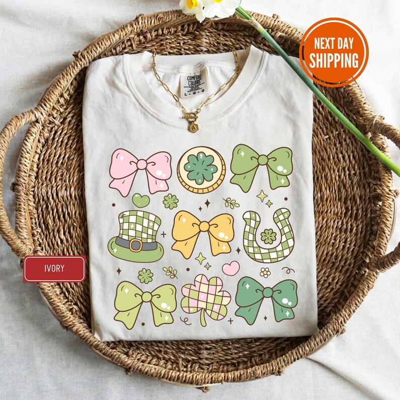 a t - shirt with bows and shamrocks on it