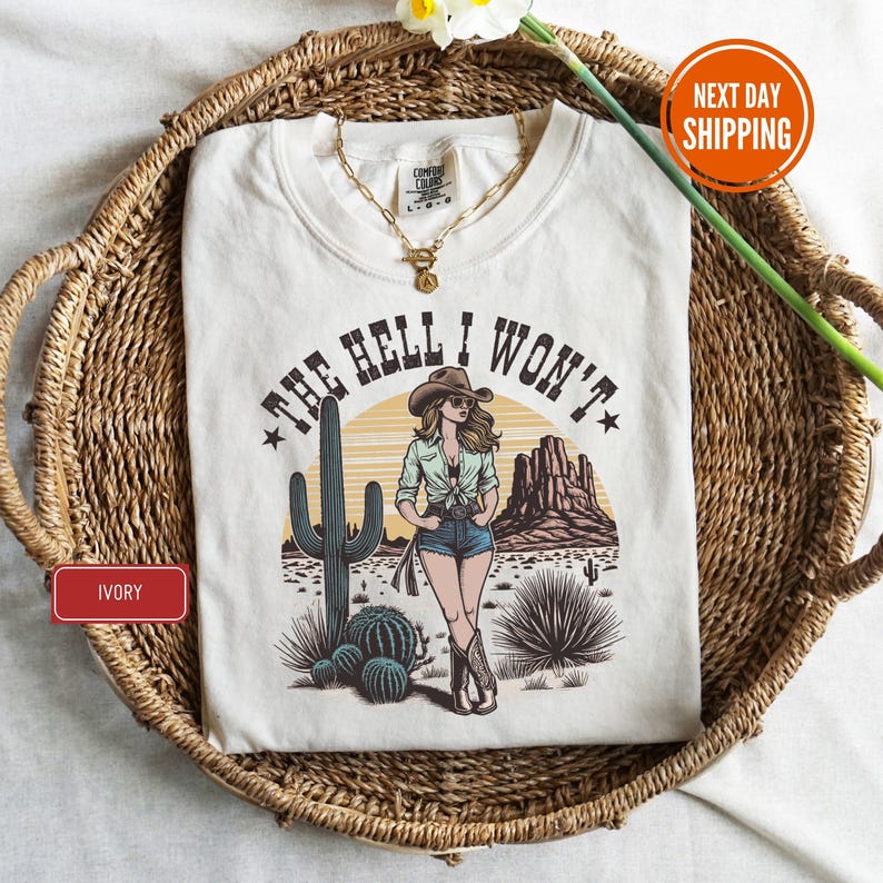 a white t - shirt with a picture of a woman on it