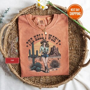 a t - shirt with a picture of a woman on it