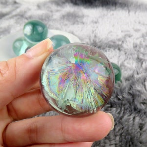 Green Fluorite Sphere: Translucent Crystal with Rainbow Sheen