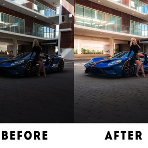 May include: A blue Ford GT sports car parked in a garage with a person standing next to it. The car has red and white stripes on the side. The person is wearing a black top and skirt.