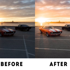 May include: Two classic American muscle cars parked in a car park at sunset. The car in the foreground is a bright orange Camaro with a white stripe. The car in the background is a black Mustang.