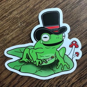 Sticker grenouille avec chapeau haut de forme, Sticker grenouille, Sticker pour ordinateur portable, Sticker bouteille d'eau, Sticker rigolo