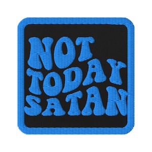 May include: Embroidered patch with the phrase "NOT TODAY SATAN" in blue bubble letters on a black background. The patch has a blue border and is square-shaped.