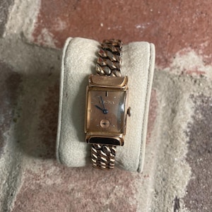 Vintage Bulova 14k rose gold filled windeup watch