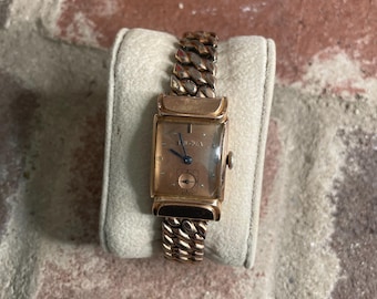 Vintage Bulova 14k rose gold filled windeup watch
