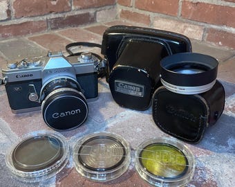 Vintage Canon T90 TANK 35mm Film SLR Camera W/ FD 50mm F/1.8 Lens